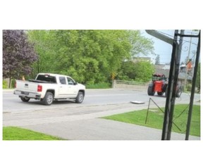 Police say they're looking for a white pickup truck and a tractor in connection with the theft of Pride flags in Oxford County, east of London. OPP photo