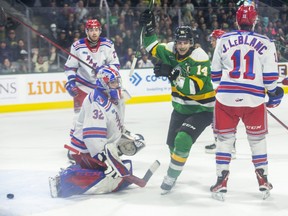 London Knights captain Luke Evangelista celebrates after teammate Sean McGurn scores on Kitchener Rangers goalie Jackson Parsons on Sunday, May 1, 2022, at  Budweiser Gardens in London. The Knights won 5-3 to take a 3-2 lead in the Western Conference quarter-final series. (Derek Ruttan/The London Free Press)