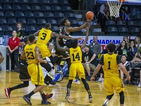 Jachai Taylor of the Windsor Express takes a shot during Game One of the playoff series against the London Lightning at Budweiser Gardens in London on Sunday May 15, 2022. The Lightning won the game 106-99. Derek Ruttan/The London Free Press