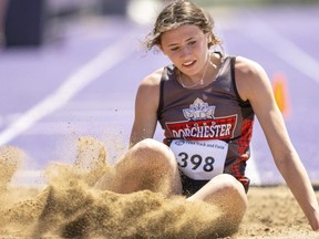 Brianna Rand of Lord Dorchester secondary school wins the senior girls triple jump with a jump of 10.96 metres minutes after winning the 100-metre hurdles at the Thames Valley Regional Athletics track and field meet at Western Alumni Stadium in London on Thursday, May 12. (Mike Hensen/The London Free Press)