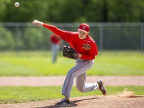 Connor Dowding of Saunders delivers a pitch to home plate in a TVRA varsity co-ed baseball playoff game against Medway on Tuesday, May 17, 2022, at the Dan Pulham diamond in London. Medway won 12-9 to move on to the semifinals. (Mike Hensen/The London Free Press)