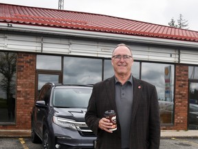 Rob Reid, of Exeter, stands in front of what will become a McDonald's restaurant at the east end of Mitchell in the Hammond Plaza this September. ANDY BADER/MITCHELL ADVOCATE