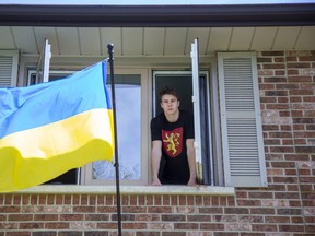 Ukrainian refugee Maxim Korolov is staying with Richard Home and his family in Coldstream. (Derek Ruttan/The London Free Press)