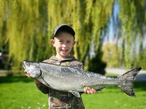 Top youth James Thompson, of Mallory Beach, with his 10.20 lb. salmon caught in the Lures N Lines Spring Trout Derby Sunday, May 15, 2022. (Kevin Harders photo)