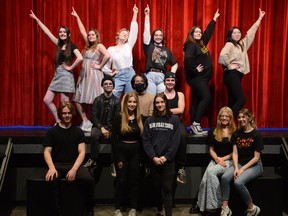 Cast and crew members of Bert Church High School's production of Mamma Mia! strike a pose in the theatre on April 29. The production hits the stage of Bert Church Theatre starting May 11.  Photo by Riley Cassidy/The Airdrie Echo/Postmedia Network Inc.
