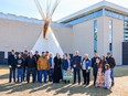 Mayor Peter Brown and City of Airdrie Council join Indigenous representatives for a pipe ceremony outside of City Hall in March. The City of Airdrie is seeking to strengthen relations with Indigenous and Metis nations to pursue meaningful reconciliation. Photo courtesy of the City of Airdrie.