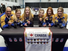 Team Myla Plett takes a celebratory photo after earning gold at the Canadian U18 Curling Championships. Photo courtesy of Blair Lenton