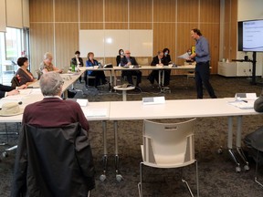 Program manager Bill Sherlock, standing, briefs Hastings and Prince Edward Counties Board of Health members on the resumption of some health unit services Wednesday at the health unit in Belleville. Services include those for sexual health, parents of babies, routine vaccinations and more.