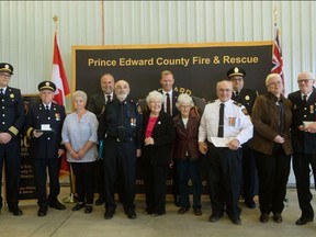 The Prince Edward County Fire Department recently honoured some of itÕs long-serving employees. Pictured (from left to right) Deputy Chief Tim Kraemer, Division Commander Roger Flower (50 year honoree), Betty Flower, MPP Todd Smith, Firefighter Leonard Bedford (50 year honoree), Marjorie Bedford, MP Ryan Williams, Gwen Bedford, Captain Bill Bedford (50 year honoree), Fire Chief Chad Brown, Louise Tolley, Retired Captain Bob Tolley (50 year honoree). SUBMITTED