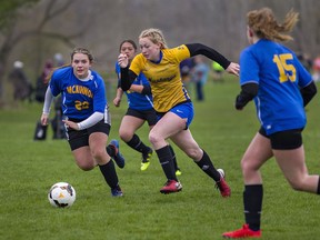 Hannah Clark of Brantford Collegiate Institute charges up the field with the ball during a high school girls soccer match against Caledonia's McKinnon Park Secondary School on Monday in Brantford. Clark scored four goals in a 5-0 BCI win. Brian Thompson
