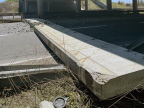 Brantford police posted a photo on Twitter of part of the Highway 403 overpass at the Wayne Gretzky Parkway that fell to the road below on May 9 after being hit by a piece of construction equipment.