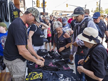 Dan Rieckermann, co-owner of Pearls Boutique on Main Street in Port Dover said t-shirt sales were brisk during the Friday the 13th Gathering. Brian Thompson/Brantford Expositor/Postmedia Network