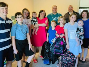 A group of children from Ukraine receive donations of backpacks, water bottles and lunch bags. While it's still uncertain how many Ukrainian nationals fleeing the war in their home country will end up in Brantford, the community is mobilizing to welcome them.
