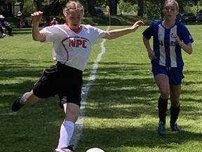 North Park Collegiate's Brenna Mitchell attempts to cross the ball during a Central Western Ontario Secondary Schools Association girls AA soccer game at Mohawk Park on Tuesday. Expositor photo