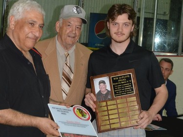 Hani Greiss and Bob Darling present his Brockville Braves Commitment and Volunteer Award to goalie Brandon Abbott.
Tim Ruhnke/The Recorder and Times