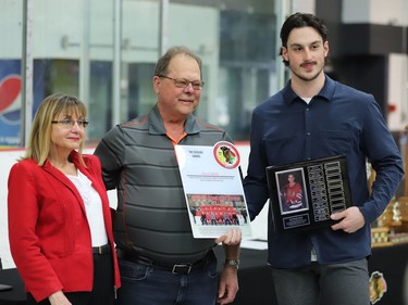 Lynn and Gerry Daoust present The Dogger Award to Owen Belisle. The honour goes to the graduating Brockville Braves player who best exemplifies a passion for the game and has a supremely positive attitude. The award is in memory of Braves player Michael Daoust.
Tim Ruhnke/The Recorder and Times