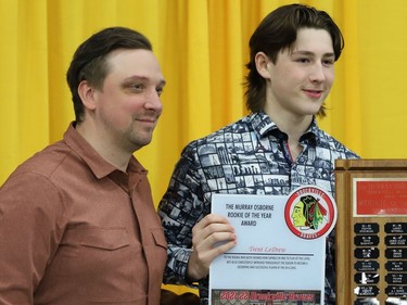 Assistant coach Matt Ward presents the Murray Osborne Rookie of the Year Award to Brockville Braves defenceman Trent LeDrew.
Tim Ruhnke/The Recorder and Times