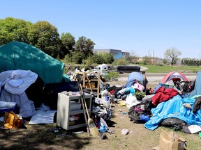 Municipal officials and other agencies are considering what to do about a homeless encampment located on an embankment overlooking Highway 401 off Stewart Boulevard in Brockville. (RONALD ZAJAC/The Recorder and Times)