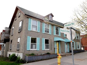 Former senator Bob Runciman and developer Simon Fuller urged Brockville council to stop and think before demolishing this historic building at the corner of Market Street West and Water Street. (RONALD ZAJAC/The Recorder and Times)