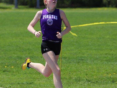 Mercedez Covey of Thousand Islands Secondary School wins the LGSAA junior girls 800-metre event on Friday afternoon. TISS will host the Eastern Ontario track and field championships May 19-20.
Tim Ruhnke/The Recorder and Times