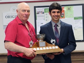 Matthew Sterling of Pain Court, accepts the Canadian Plowing Organization's championship in the junior conventional class at the Canadian Plowing Championship in Rivers, Man. (Handout/Postmedia Network)