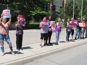 Members of Unifor Local 127 held a protest in front of Riverview Gardens long-term care home in Chatham on May 27. The union is leading a call to have the provincial government provide a $3 increase in pay for all employees of long-term care homes, not just personal support workers. (Ellwood Shreve/Chatham Daily News)