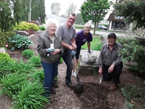 Members of the Rotary Club of Chatham Sunrise recently planted sunflower seeds at the Veterans Tribute Garden in Chatham. The club is distributing sunflower seeds as a fundriaser to support humanitarian aid in Ukraine. Shown here are Rotarian Ruth Howell, Rotarian Roger McRae, park caretaker Leslie Waddell and Rotarian John Lawrence. (Handout/Postmedia Network)