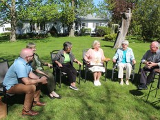 Ontario NDP leader Andrea Horwath, third from right, received some baked goods Friday during her visit to the Charing Cross home of Vera Moore, third from left, to outline the party's pledge of tax deferrals and investing $1 billion in home care to help seniors stay in their homes longer. Also pictured, from left, includes Chatham-Kent-Leamington NDP candidate Brock McGregor, Mary Moore and Pat and Doug Jackson. (Ellwood Shreve/Chatham Daily News)