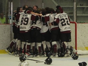 The Chatham Maroons celebrate winning the Greater Ontario Junior Hockey League Western Conference Championship with a 5-2 win over the Leamington Flyers on Saturday at Memorial Arena, to capture the series in six games. PHOTO Ellwood Shreve/Chatham Daily News.