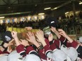 The Chatham Maroons celebrate winning the Greater Ontario Junior Hockey League's Western Conference championship with a 5-2 win over the Leamington Flyers at Chatham Memorial Arena in Chatham, Ont., on May 14, 2022, to capture the series in six games. Ellwood Shreve/Chatham Daily News/Postmedia Network