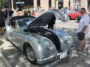 This 1956 Jaquar XK140 DHC was among the many impressive classic cars on display in downtown Chatham Saturday during RetroFest.  PHOTO Ellwood Shreve/Chatham Daily News