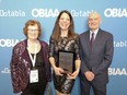 Central Huron received the Streetscaping and Public Realm Improvement award for Clinton's Artist Alley at a gala during the 2022 BIA Annual Conference. Pictured from left are Coun. Alison Lobb, community improvement co-ordinator Angela Smith and Deputy Mayor Dave Jewitt. Handout