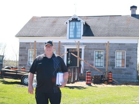Curator of the Cornwall Museum Jean-Yves Lemoine in front of the museum under construction on Thursday May 5, 2022 in Cornwall, Ont. Laura Dalton/Cornwall Standard-Freeholder/Postmedia Network