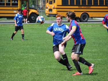 St. Lawrence player Zach Chartrand (left) and a La Citadelle defender looking to tame an air ball in senior boys' soccer action. Photo on May 12, 2022, in Cornwall, Ont. Todd Hambleton/Cornwall Standard-Freeholder/Postmedia Network