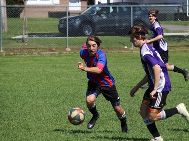 La Citadelle's Sebastien Aubin (left) and L'Heritage's Connor Fox have designs on the ball in first-half action. Photo on Wednesday, May 18, 2022, in Cornwall, Ont. Todd Hambleton/Cornwall Standard-Freeholder/Postmedia Network