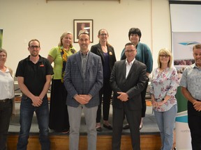 Representatives of the North and South Dundas Chambers of Commerce, as well as the Dundas Federation of Agriculture, pose with five of six local candidates running in the 2022 provincial election Thursday May 26, 2022 in Chesterville, Ont. Shawna O'Neill/Cornwall Standard-Freeholder/Postmedia Network