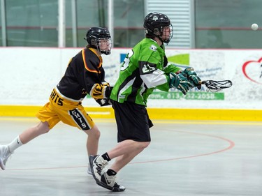 Cornwall Celtics Liam Ault about to catch the ball with Nepean Knights Callan Dent on his tail on Friday May 20, 2022 in Cornwall, Ont. The Celtics won 5-4. Robert Lefebvre/Special to the Cornwall Standard-Freeholder/Postmedia Network