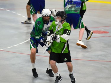 Cornwall Celtics Brock Turcotte catches the ball with Peterborough Lakers Brodie Roberts applying pressure on Sunday May 22, 2022 in Cornwall, Ont. The Lakers won 13-4. Robert Lefebvre/Special to the Cornwall Standard-Freeholder/Postmedia Network