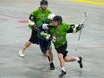 Cornwall Celtics Brock Turcotte, with possession, almost being high-sticked by a Peterborough Lakers player on Sunday May 22, 2022 in Cornwall, Ont. The Lakers won 13-4. Robert Lefebvre/Special to the Cornwall Standard-Freeholder/Postmedia Network