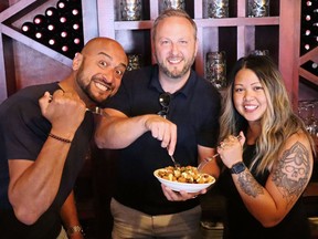 Handout/Cornwall Standard-Freeholder/Postmedia Network
The 2022 Poutine Love team from the Taste Buds, from left-- Matthew Girgis, Patrick Larose, and Justine Viray-Levac.