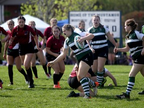 The Grey Highlands Lions march down the field en route to a 22-0 victory over the Preston Panthers Friday morning in a pool-play match at the CWOSSA A/AA senior girls rugby championship hosted at Victoria Park in Owen Sound. Greg Cowan/The Sun Times