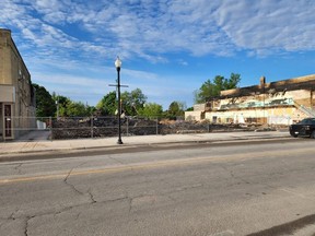 A fence has been put up along the site of the fire that hit downtown Hanover on May 19, 2022.