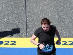 Janet Goddard crossing the finish line. Submitted