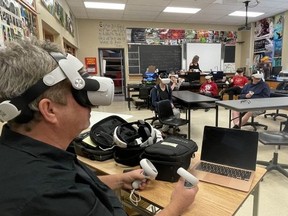 Dan Hawes (left) in contact with students in the virtual classroom. Catherine Smith