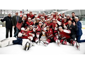 Woodstock's Adam Wallace (far right with hat) made a little history as head coach of the Cambridge RedHawks' first Cherrey Cup championship.