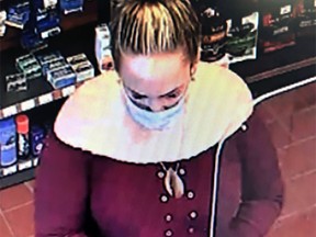 Kingston Police are searching for this woman in connection to a theft from a downtown sports facility and credit card fraud on April 10.