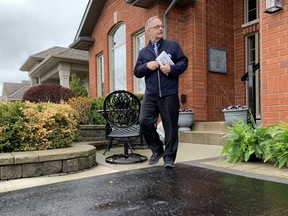 Kingston and the Islands Progressive Conservative candidate Gary Bennett canvasses in a west-end Kingston neighbourhood on May 4.