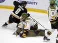 Kingston Frontenacs winger Martin Chromiak (8) tries to get past North Bay Battalion goaltender Dom DiVincentiis during Game 3 of their Ontario Hockey League Eastern Conference semifinal in Kingston on May 9. Chromiak scored twice in the Frontenacs' 6-5 loss in Game 5 on Saturday night in North Bay.