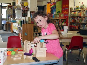 Seven year-old Kalyssa Kyle had a fun time building this castle during a recent trip to the Teck Centennial Library.