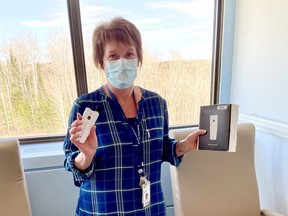 Susan Rankin, Psychiatric/Special Projects RN at BRH holds one of the Pocket Talkers donated by the Timiskaming Hearing Clinic. Photo courtesy of Blanche River Health.